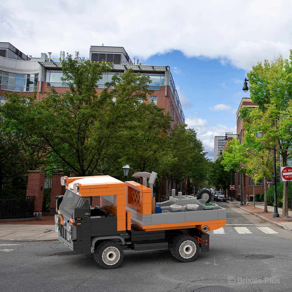BRIXIES Plus Lindner Uni Trac Municipal orange
